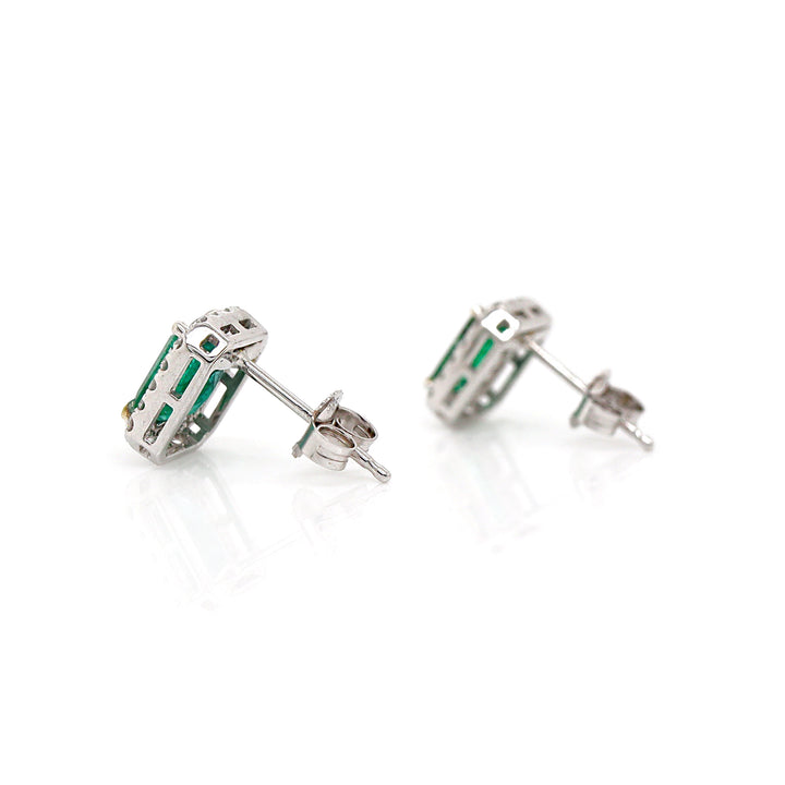 14CT White Gold Emerald And Diamond Earrings
