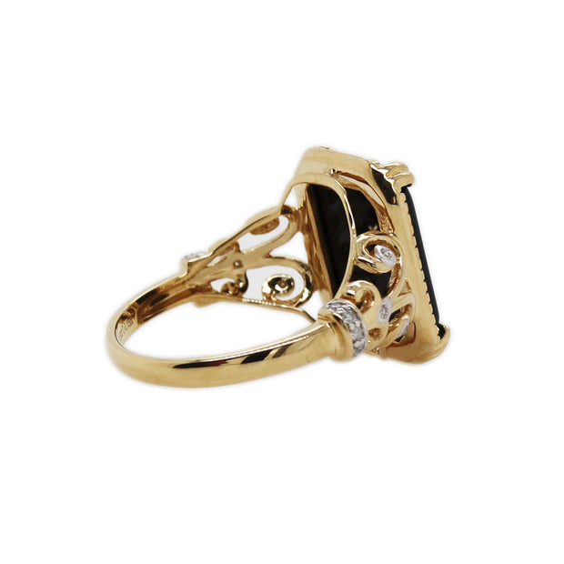 14CT yellow gold black onyx and diamond ring
